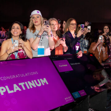 Convention-PhotographyColdea Productions captures the excitement of audience members at the Modere Platinum award celebration at Anaheim Convention Center, showcasing the crowd's engagement and enthusiasm