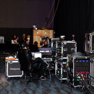Convention-Photography Backstage setup with technical equipment and crew at an event, captured by Coldea Productions for seamless event production
