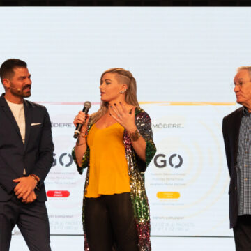 Conference-Photography Scentsy representatives speaking on stage at the Envision 20/20 conference, captured by Coldea Productions, highlighting dynamic corporate presentations.