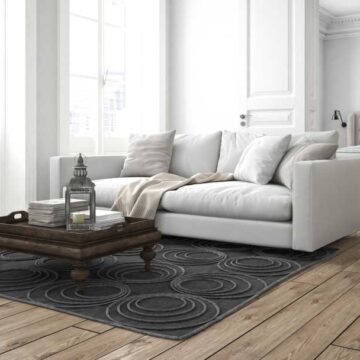 Elegant living room and bedroom in a modern apartment, captured by Coldea Productions as part of their real estate photography services