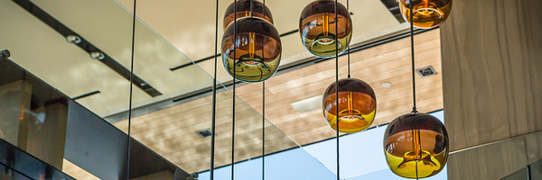 Modern glass pendant lighting installation captured for a real estate marketing project by Coldea Productions in Marina del Rey, California.