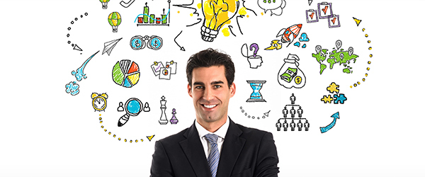 A confident businessman in a suit standing with crossed arms, smiling, with a vibrant and creative business concept doodle background featuring various icons like light bulbs, charts, graphs, rockets, and magnifying glasses.