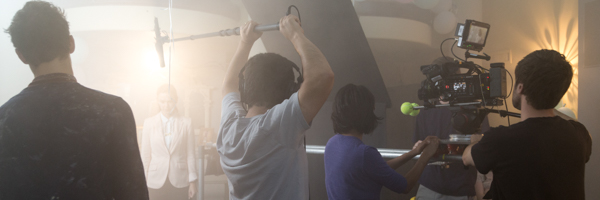 Coldea Productions crew filming a commercial scene with professional sound and camera equipment in Carlsbad, California.