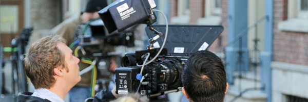 Coldea Productions filming a commercial on location with professional video equipment and crew.