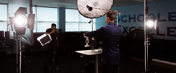 Rob Gledhill from Blue-White Industries presenting the functionality of Plastic Chemical Feed Skids, with Alexis Mendez from Coldea Productions filming the product presentation video.