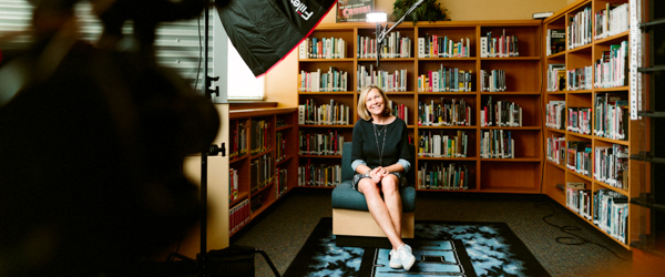 Professional interview setup with lighting in a library setting, ideal for video production companies in Phoenix, AZ, by Coldea Productions.