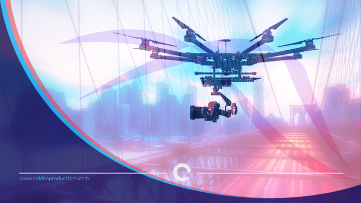 A professional drone equipped with a camera flying over a cityscape, showcasing Coldea Productions aerial drone photography and videography services